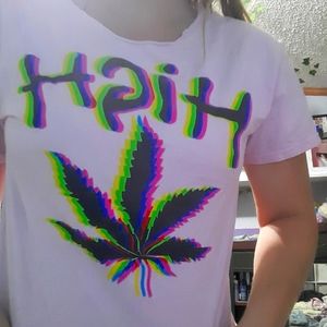 A pink tee that says high